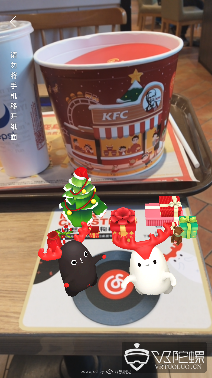 网易联手KFC推出线下“网易云音乐主题店”，扫描送AR圣诞礼物